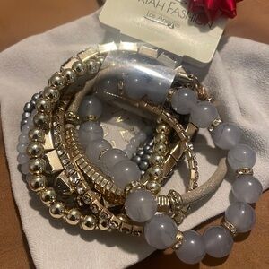 ✨Silvertone 8 pc. Stretch bracelet set